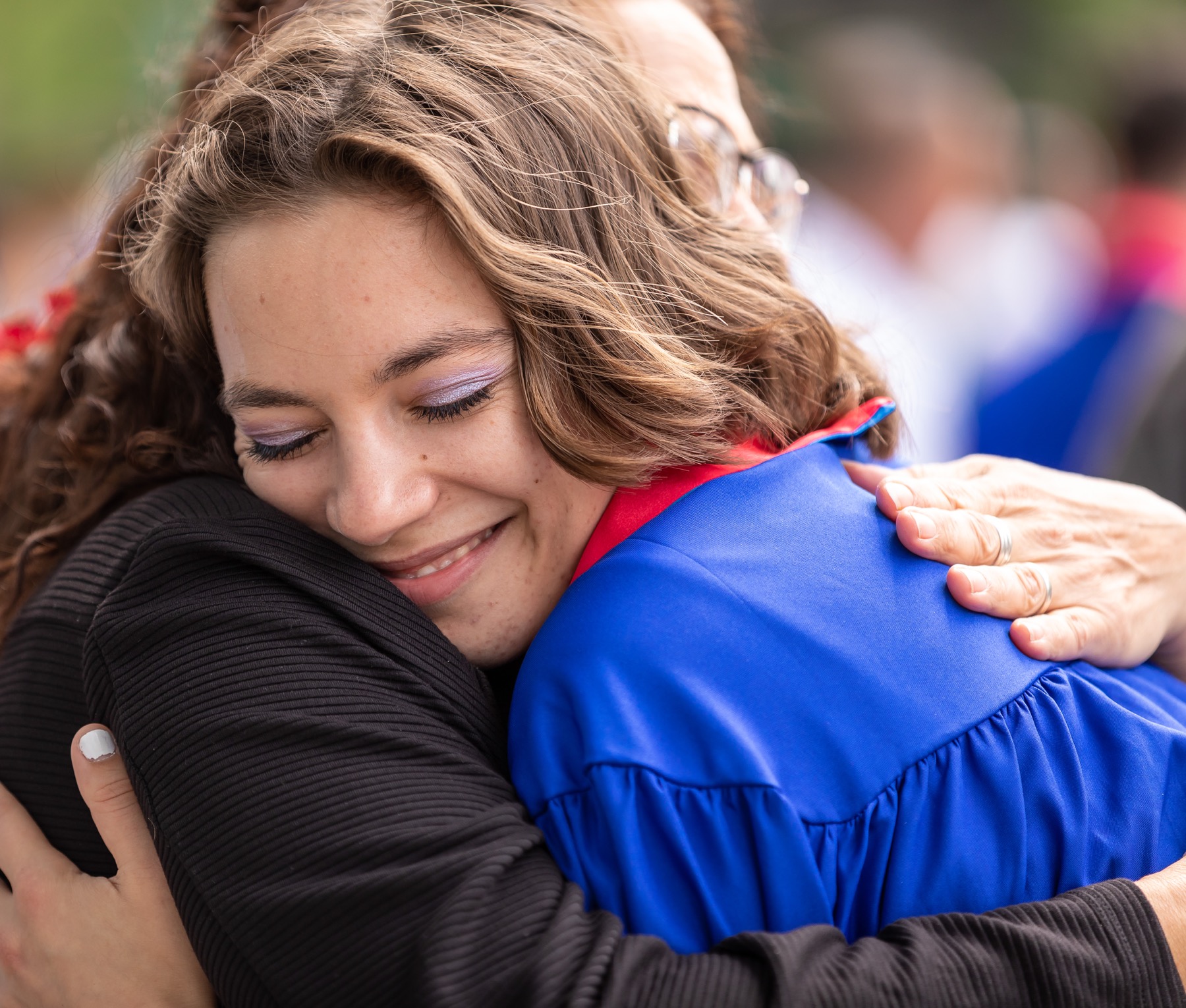 A graduate hugged her mother in gratitude for her support throughout her years at DePaul.